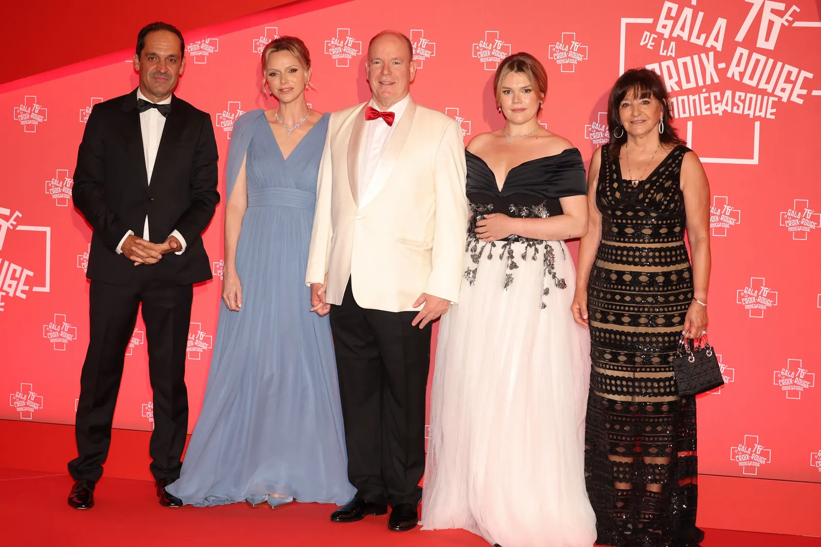 L'image peut contenir Albert II, prince de Monaco, Amy Sloan, Charlene, princesse de Monaco, première mode et vêtements